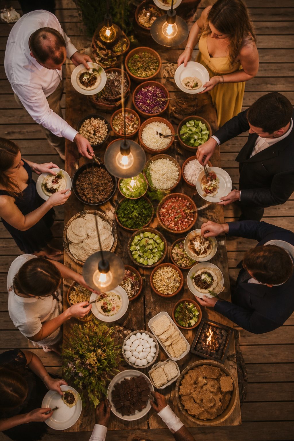 A build-your-own taco bar at a wedding reception.