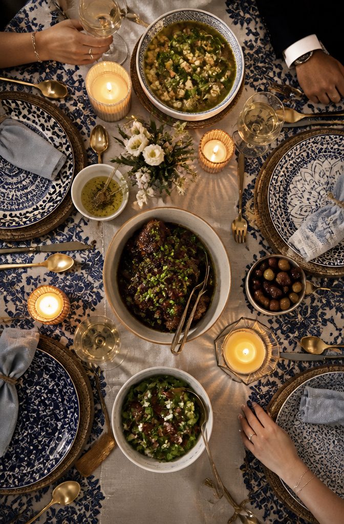 A wedding table set with dishes from both families' culinary traditions.