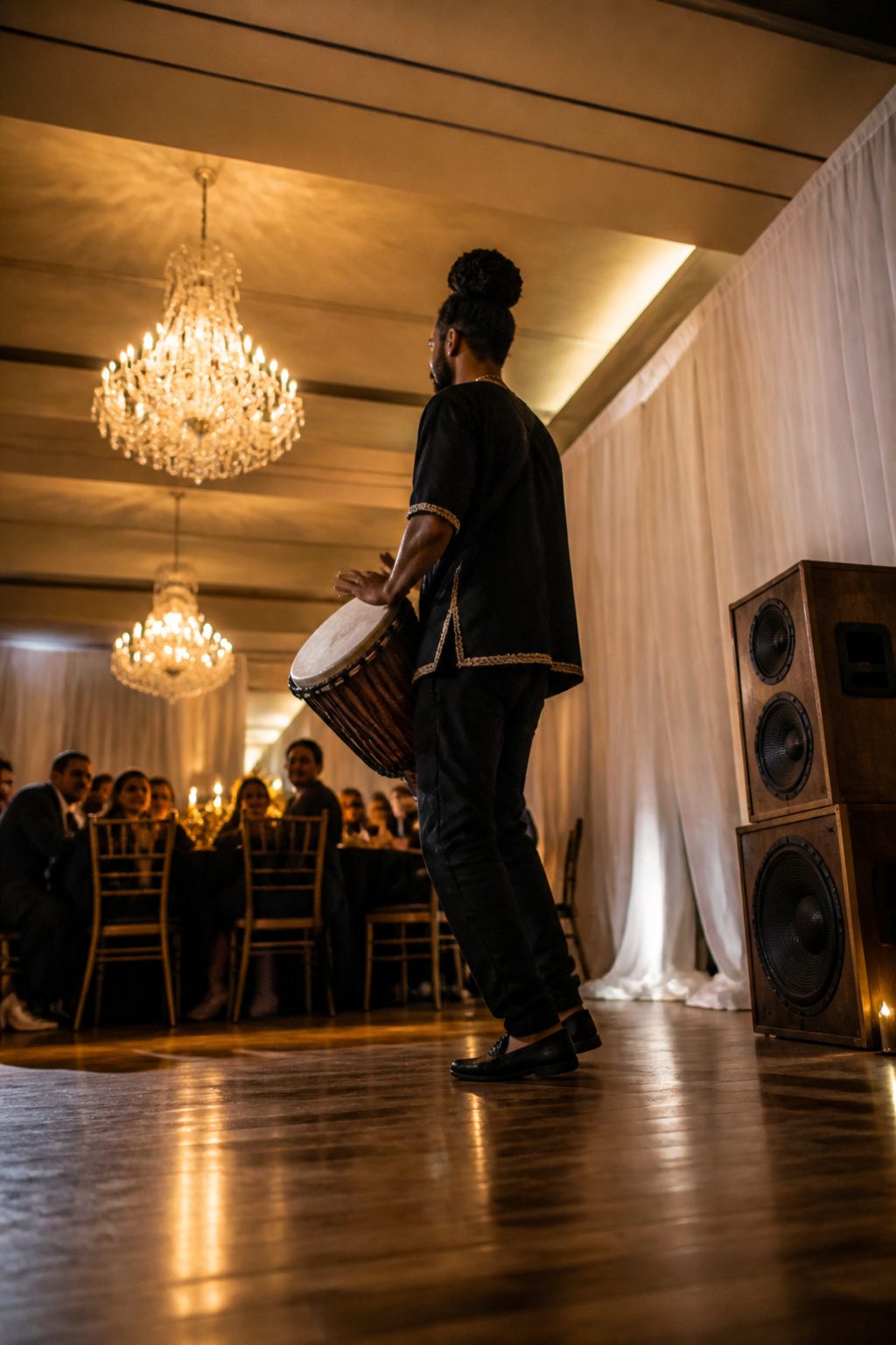 Drummer performing as guests await the couple's arrival.
