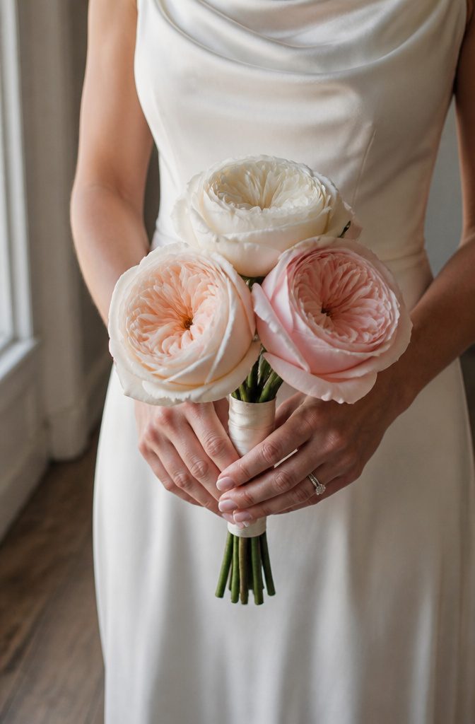20 Special Wedding Ideas for a 2026 Celebration You'll Remember 1 A single garden rose bouquet held with a simple ribbon.