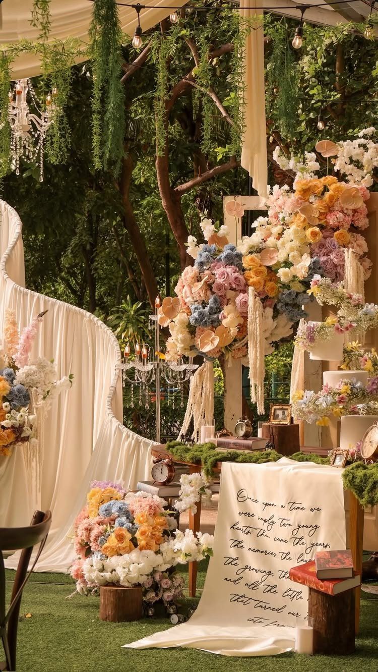 22 Wedding Decor Garden Theme Ideas for Every Reception Style 5 Floral wedding arrangements and draped white fabric with vintage decor elements in a garden setting.