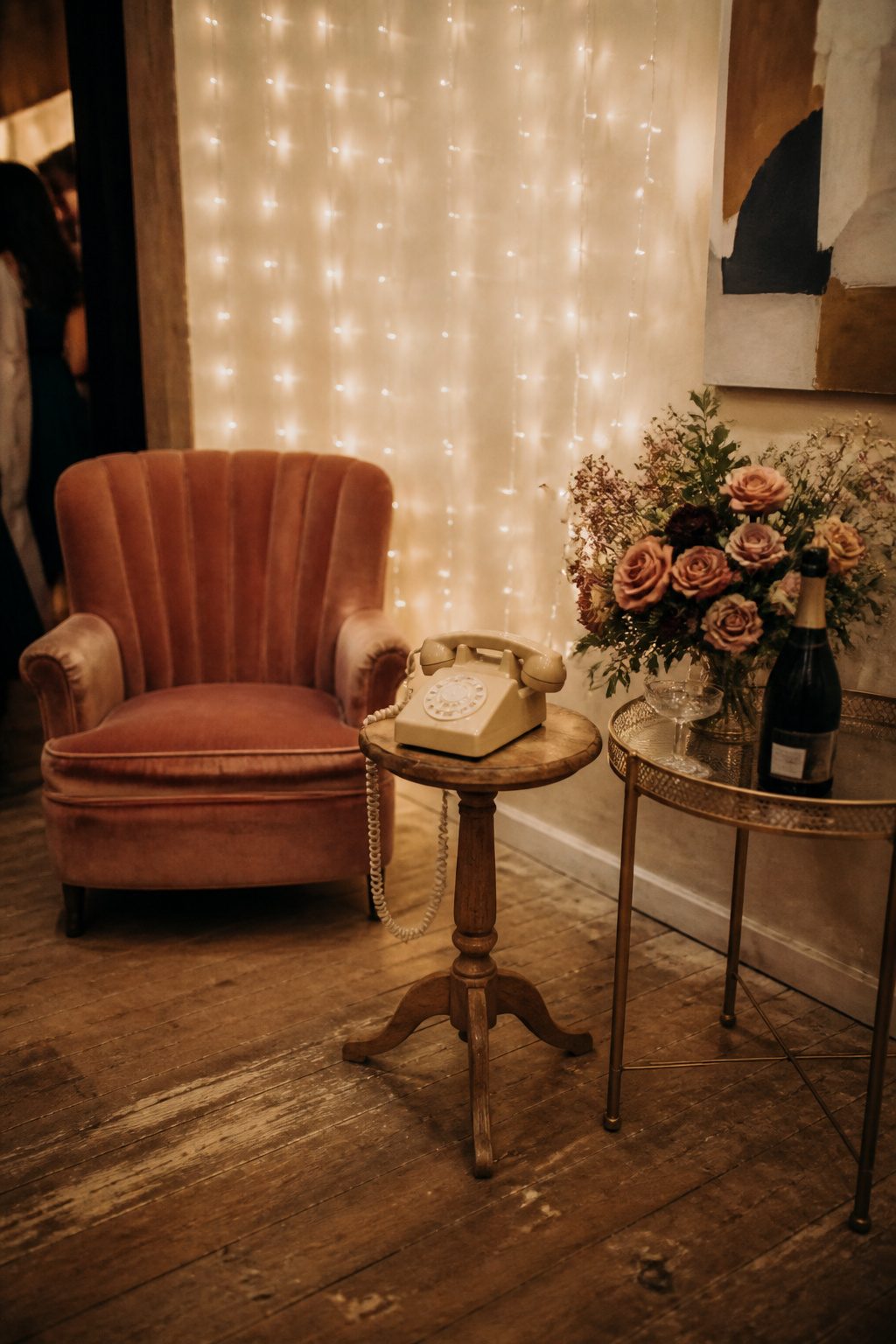 20 Wedding Sign In Ideas Guest Books Couples Actually Keep 1 A vintage rotary phone on a rustic table with floral arrangements.