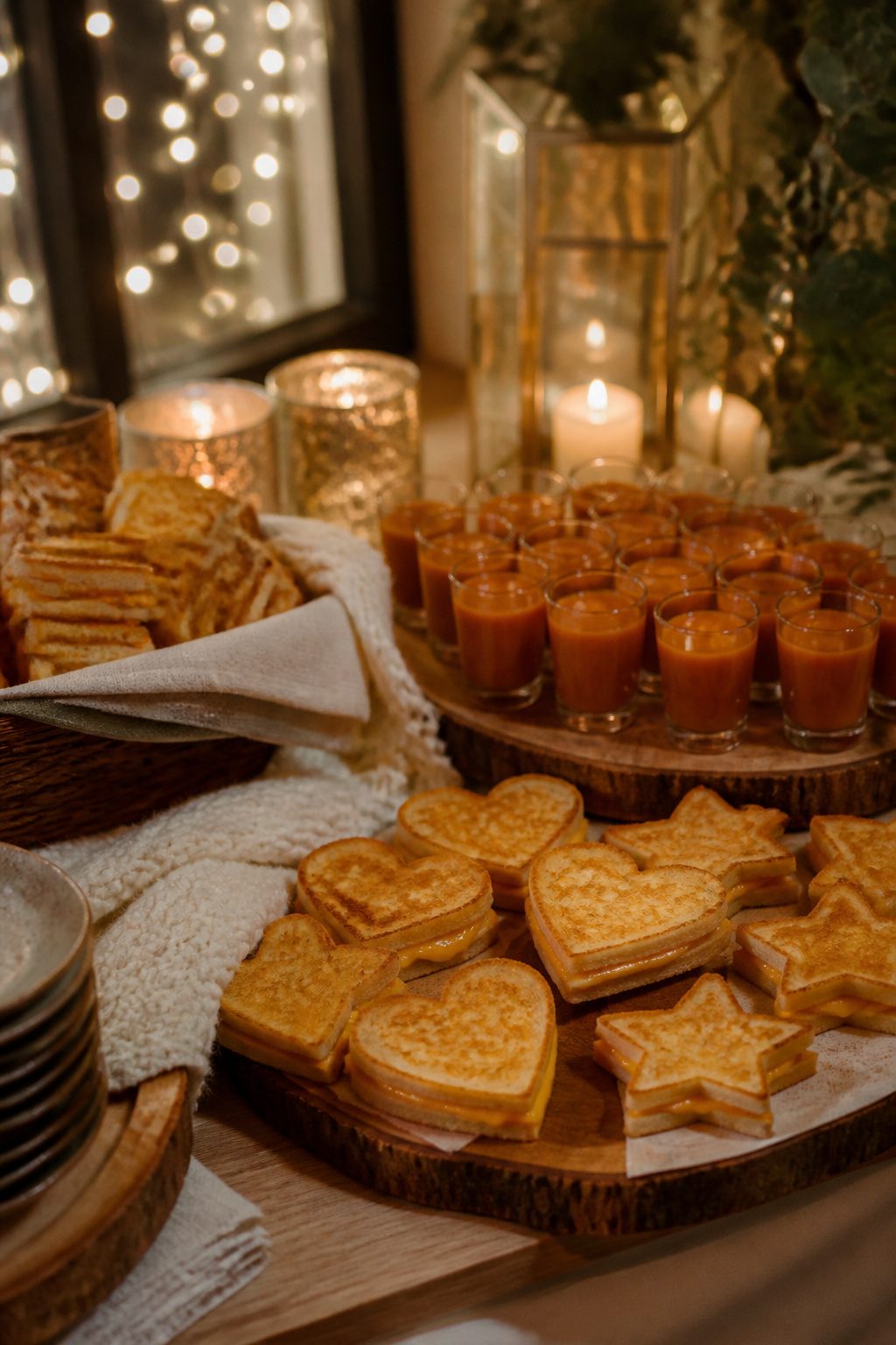 24 Wedding Station Ideas for 2026 Receptions 9 Grilled cheese sandwiches and tomato soup in shooter cups.