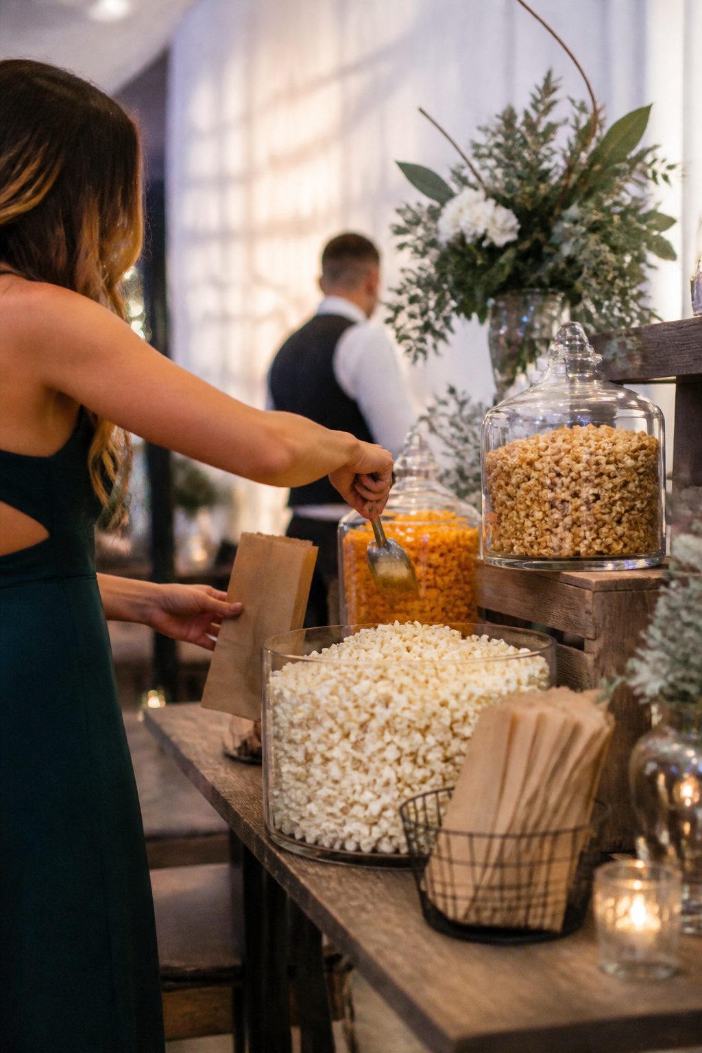 24 Wedding Station Ideas for 2026 Receptions 12 Glass containers filled with different popcorn flavors.