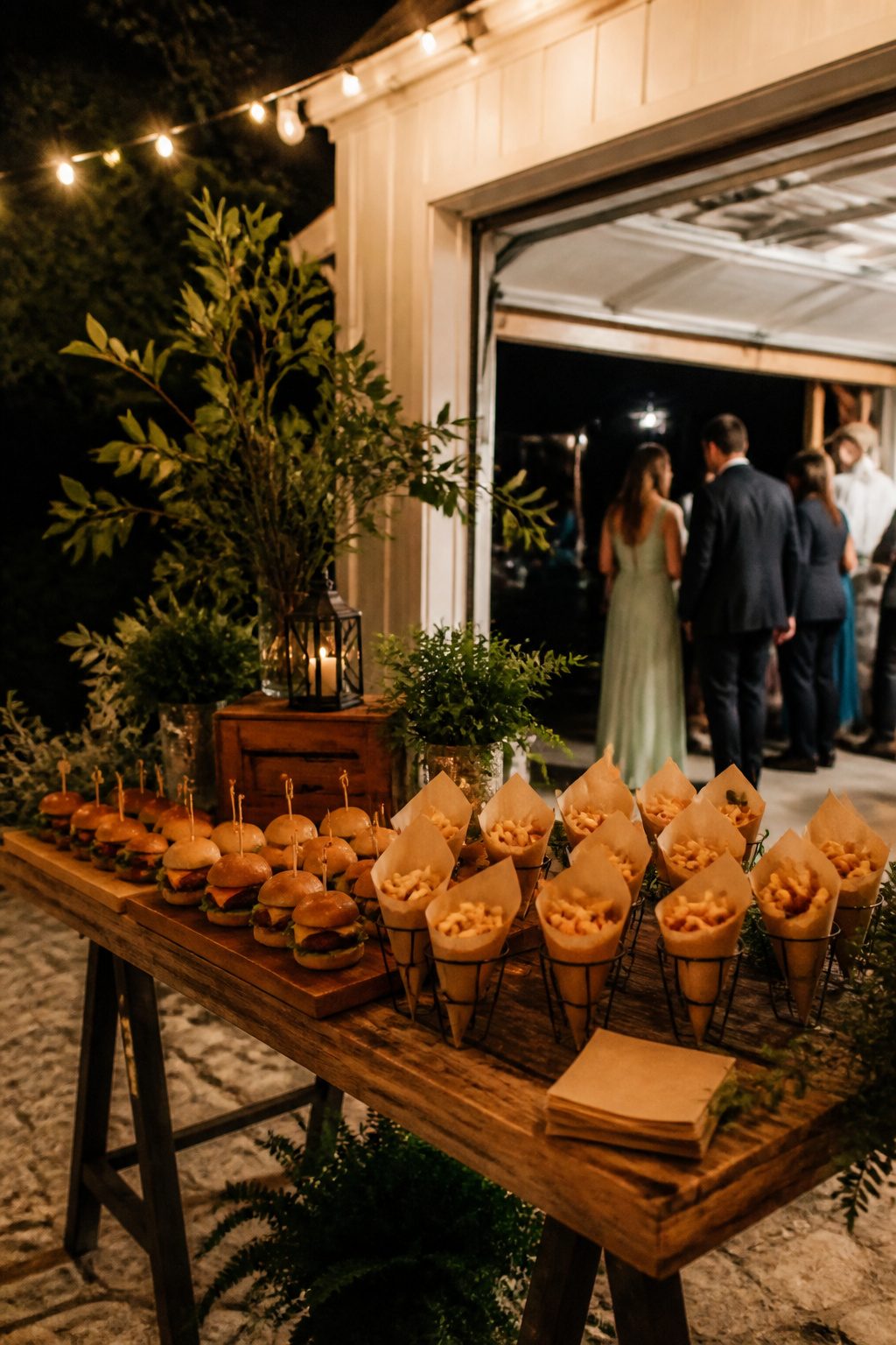 24 Wedding Station Ideas for 2026 Receptions 29 Wooden table with sliders and fries set up for late-night guests.